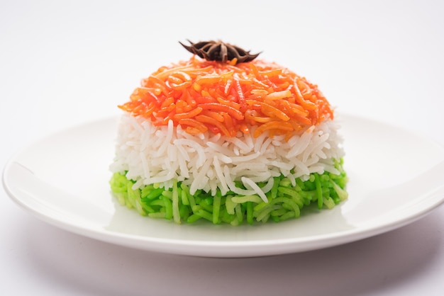 Tricolor Tiranga Rice for indian Republic and Independence day, served in a ceramic plate, selective focus