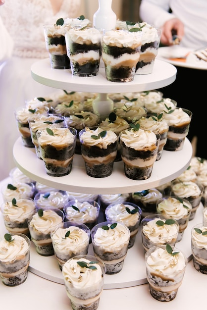 Trifles on a stand at a wedding red velvet and chocolate