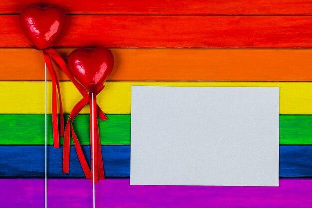 Photo trims in rainbow colors colorful wooden background gay flag