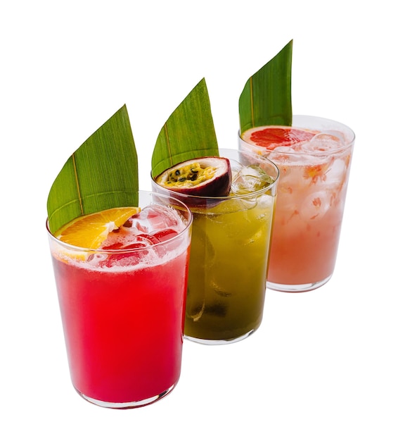 Trio of tropical cocktails with exotic garnishes