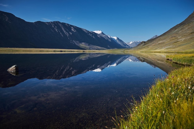 Trip through mountain valley of Altai mountains Mountain peaks rivers lakes and glaciers Border of Russia and Mongolia amazing landscape