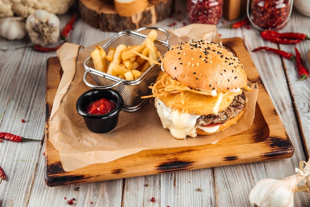 Triple cheese burger with beef patty friessauce