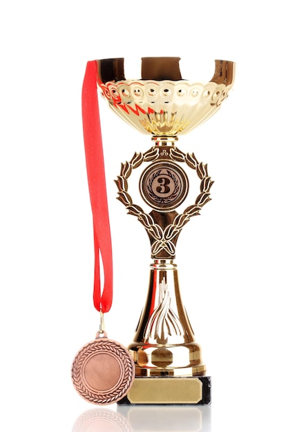 Trophy cup and medal isolated on white