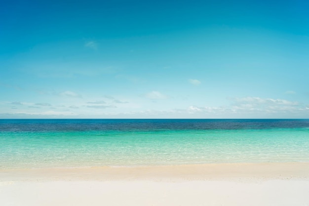 Tropical beach and sea with sunny sky