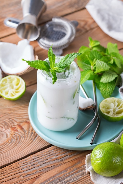 Tropical caribbean cocktail mojito with coconut cream and hard seltzer