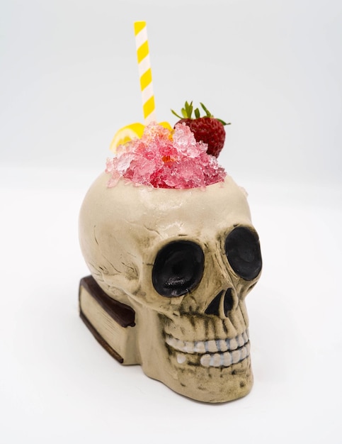 Tropical cocktail served in a skullshaped glass