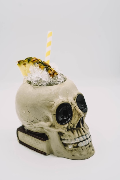 Tropical cocktail served in a skullshaped glass