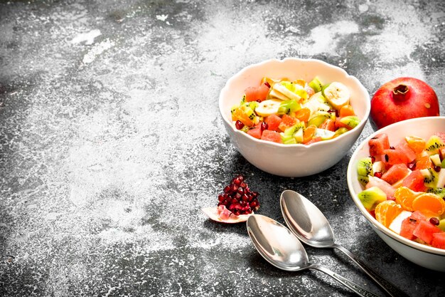 Tropical food. Fresh salad of fruits.