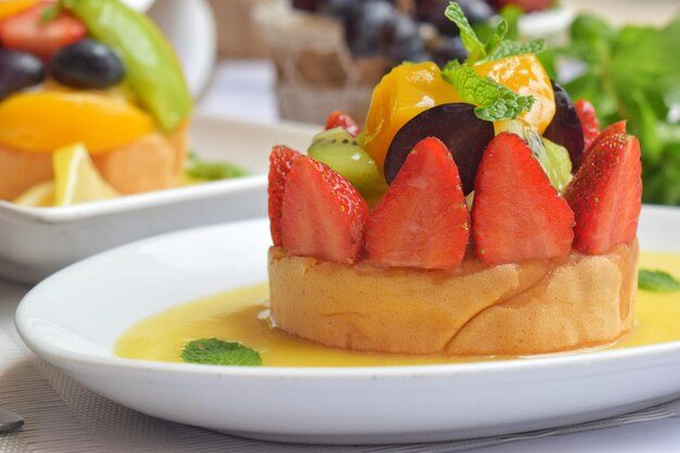 Tropical fruit cake on table