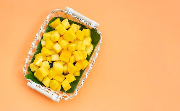 Tropical fruit, Mango cube slices in bamboo basket