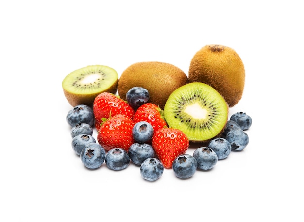 Tropical fruits and berries, blueberries, kiwis, strawberries isolated on a white background