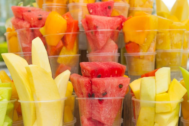 Tropical fruits in containers typical food of colombia to sell in the streets