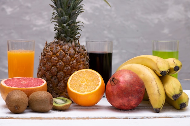 Tropical fruits on wooden table