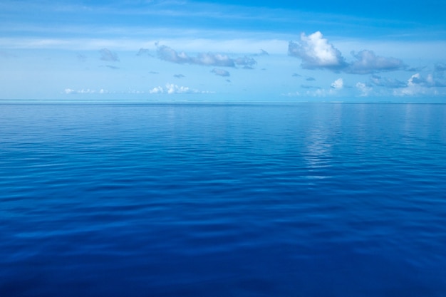 Tropical Maldives island with white sandy beach and sea