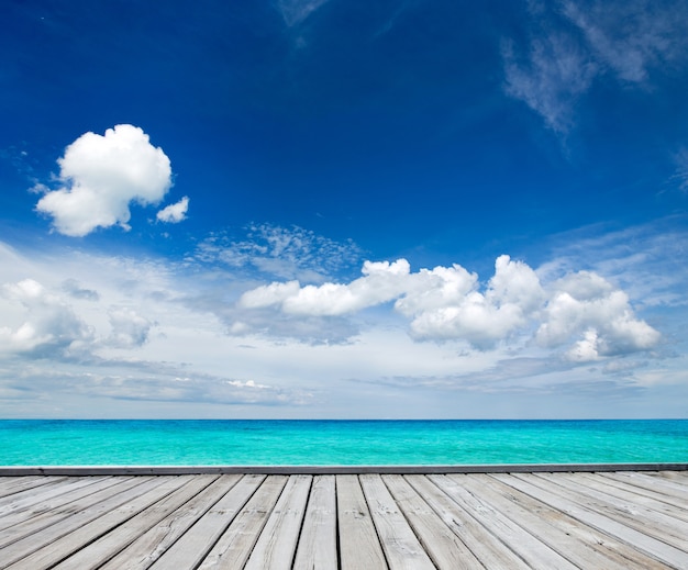 Tropical Maldives island with white sandy beach and sea