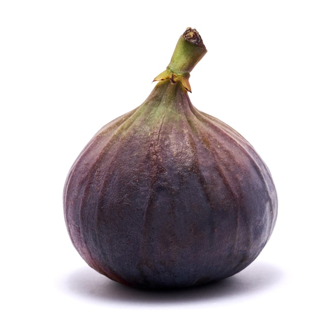 Tropical ripe purple fig fruit isolated on a white background