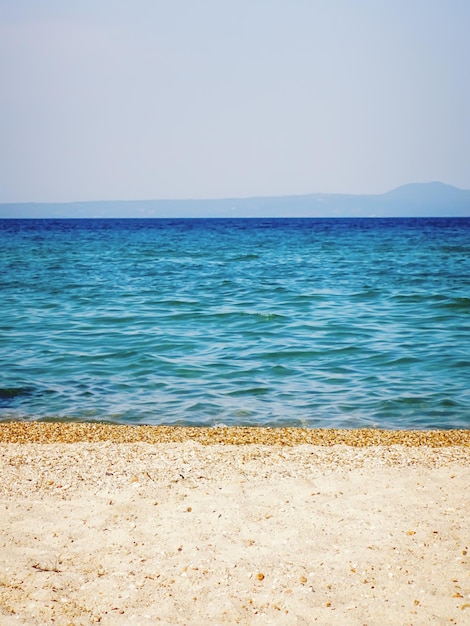 Tropical seascape. Sky and sea Sand  beach.