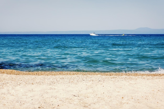 Tropical seascape. Sky and sea Sand  beach.