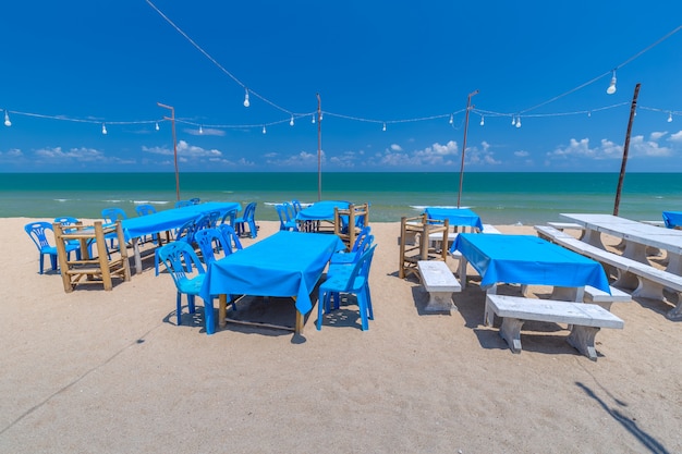 Tropical seaside dining table in thailand