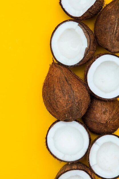 Tropical summer coconut on a yellow background