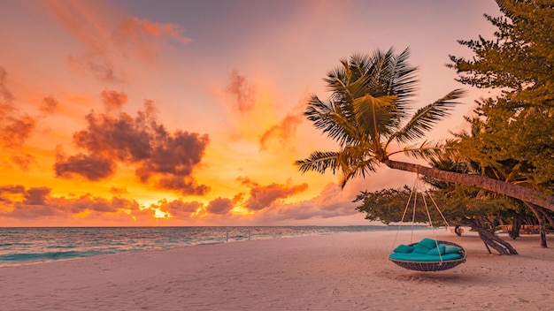 Tropical sunset beach background summer landscape panorama with beach swing, couple romance travel