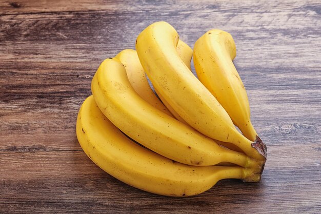 Tropical yellow banana fruit heap isolated