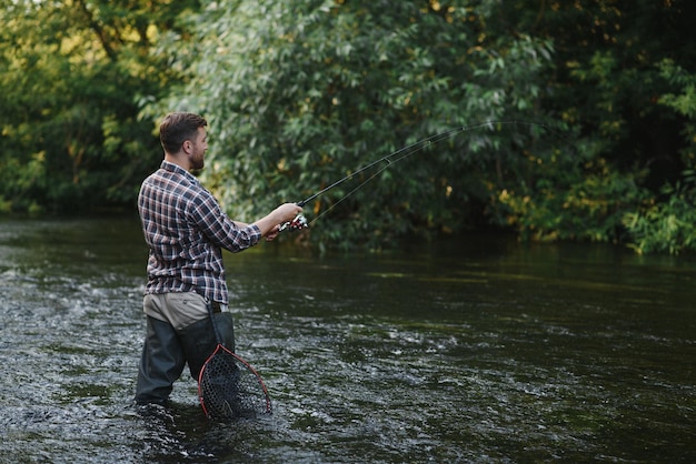 Trout fishing on mountain river