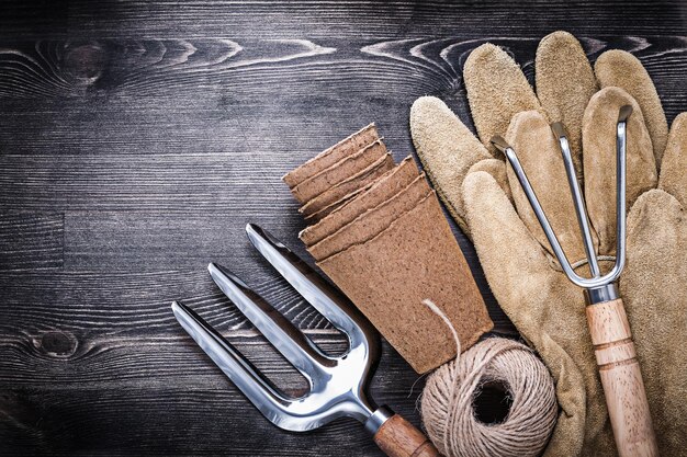 Trowel fork rake leather gloves hank of rope peat pots