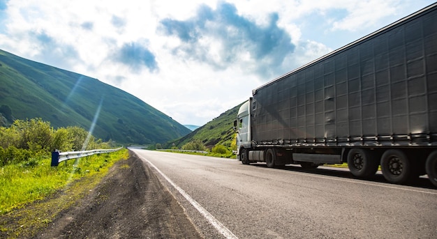 Truck on highway cargo transportation concept