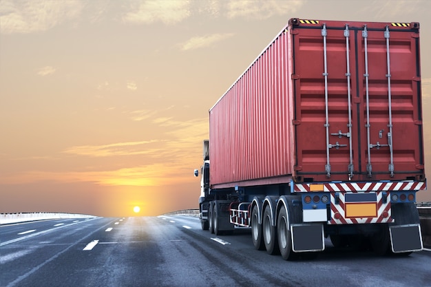 Photo truck on highway road with red container