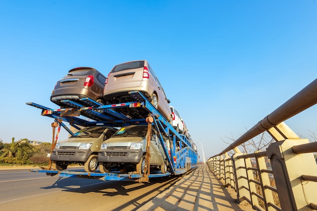 Photo truck loaded with car