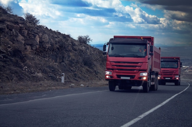 Truck riding along road