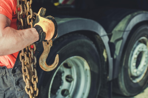 Photo trucker with chains and hook