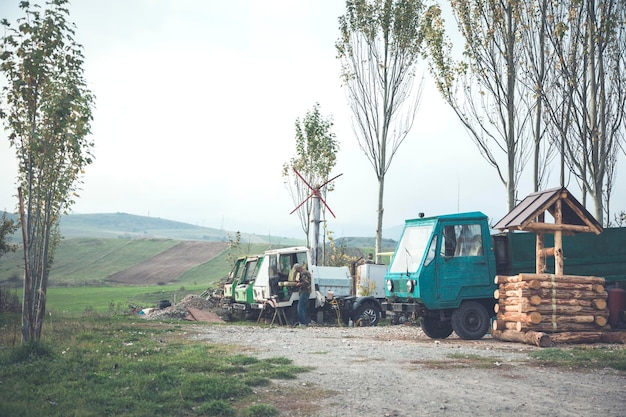 Trucks and wells in village