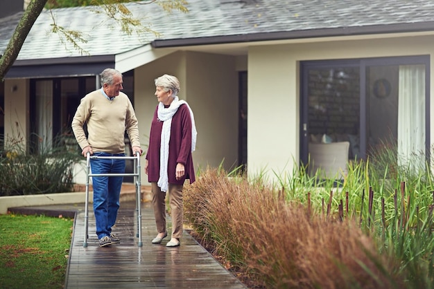 Photo true love is timeless shot of a loving senior couple taking a walk outside