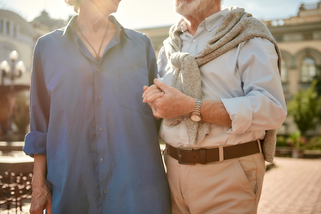 True love never dies cropped photo of senior couple holding hands while standing together outdoors