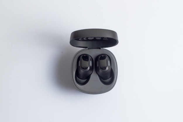 True Wireless Stereo earbuds in black on a white background