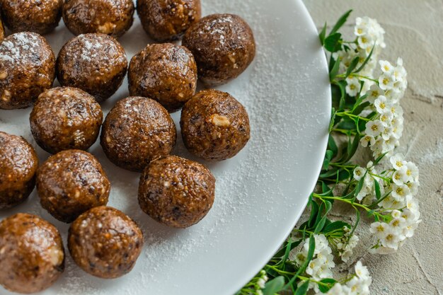 Truffles with cocoa coconut and sesame seeds delicious dessert