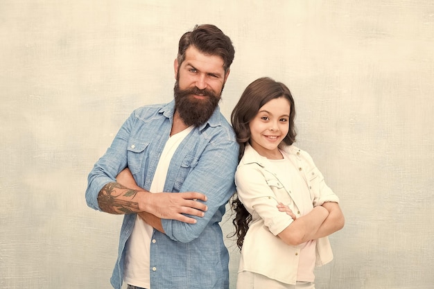 Trust and support Best friends Team of dad Bearded hipster man and adorable child girl We are team Family team Father and daughter teammates Parenthood and childhood Fathers day concept