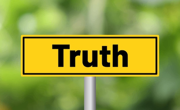 Photo truth road sign on blur background