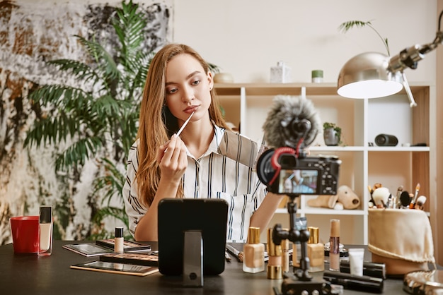 Trying a new color young female blogger trying a new lipstick color while making new