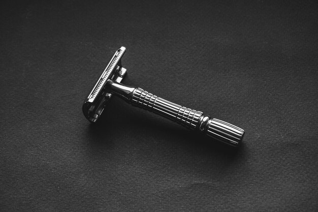 Tshaped razor on a black background