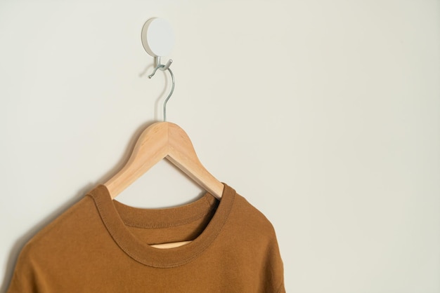 tshirt hanging with wood hanger