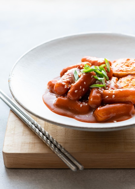 Tteokbokki rice stick in spicy sauce traditional korean cuisine selective focus