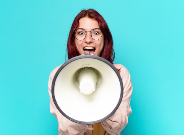 Tty woman shouting with a megaphone