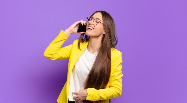 Tty woman showing her cell screen.