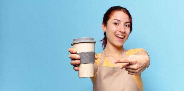 Tty woman with a take away coffee