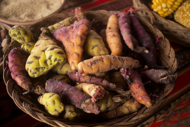 Tubers peru. In the pachamanca ceremony, variety of meat and vegetables are cooked under hot stones.
