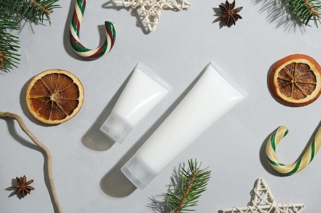 Tubes of moisturizer and a Christmas decoration