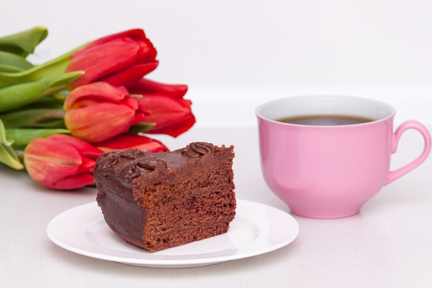 Tulips, cake, cup for mother, wife, daughter, girl with love. Happy birthday,